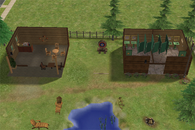 An overhead view of a Sims 2 community park with a cafe area, outdoor grill, restrooms, target practice, pond edge, and cabin-style buildings.