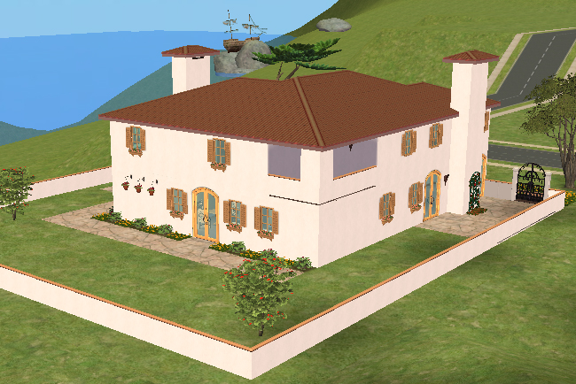 Back exterior view of Villa Rosa showing the walled rear garden, red tile roofing, shuttered windows, patio doors, stone paths, and Mediterranean-style landscaping.