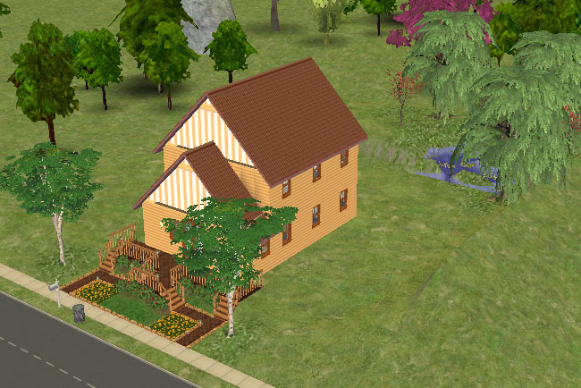 An angled view shows the yellow farmhouse with a steep roof, white painted gable panels, front porch, side stairs, trees, and a large open yard.