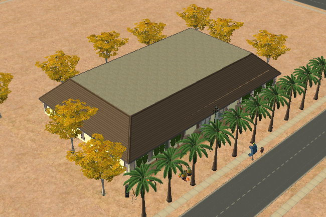 An angled exterior view shows the long brown-roofed market building surrounded by palm trees, yellow-leaved trees, desert terrain, and sidewalks.