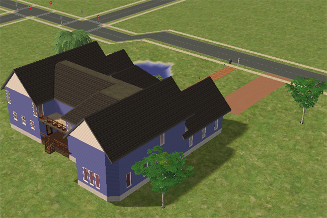 The rear exterior of a large Sims 2 manor with blue siding, multiple roof sections, a back deck, trees, and a brick driveway.