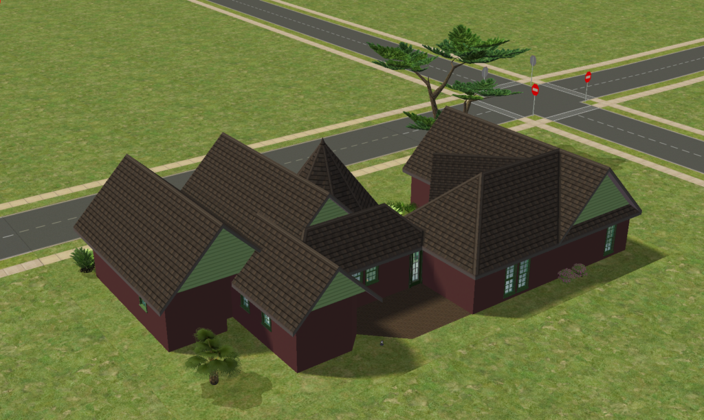 An elevated rear view shows Brandywine’s stepped roofline, dark red walls, pale green gables, small back patio area, surrounding sidewalks, and a tree near the back of the lot.