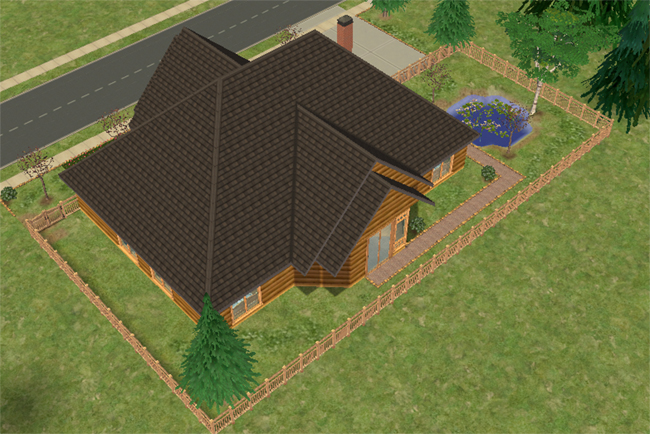 The rear of a log cabin-style Sims 2 house with a fenced backyard, pond, trees, chimney, and layered dark rooflines.