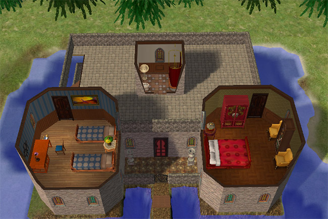 An overhead view of the second floor with two bedrooms, a bathroom, a large roof terrace, stained-glass windows, and water surrounding the house below.