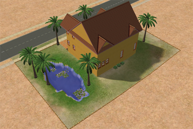 The rear of a yellow desert home with palm trees, a small pond, flowering water plants, a brown roof, and open sandy yard space.