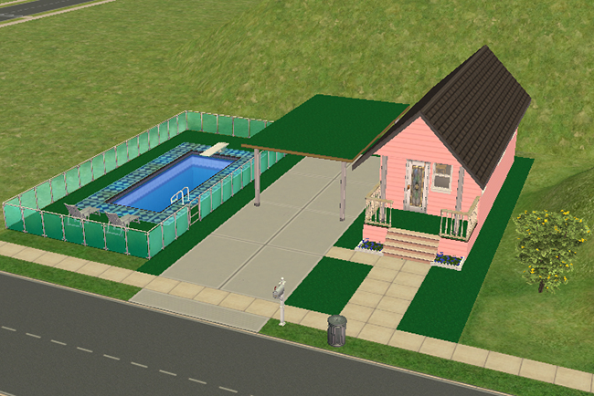 Exterior view of a tiny pastel pink starter home with bright green Astroturf landscaping, a covered carport, fenced backyard pool with blue patterned tile, and a steep dark roof.