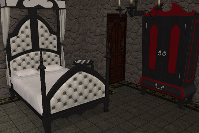 A bedroom with a black and white canopy bed, red furniture, a fireplace, tall windows, and dark tiled flooring.