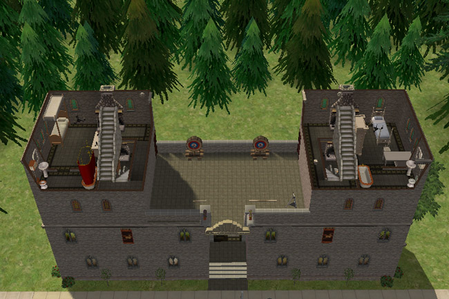 An overhead view shows two tower bedroom suites with staircases, fireplaces, attached bathroom areas, gothic windows, and an open space between the towers.