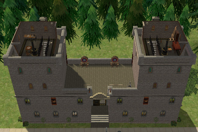 An overhead view shows the highest tower rooms with staircases, dark flooring, small furnishings, activity objects, gothic windows, and open space between the towers.