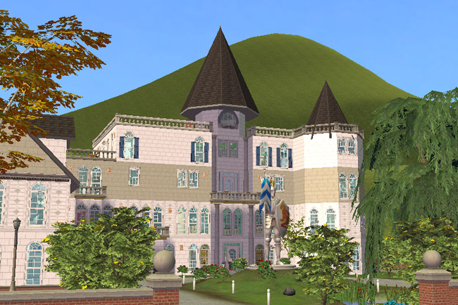 A closer exterior view shows the hotel’s front lawn, tower, pale peach walls, tall windows, dark roofs, landscaping, and front path.