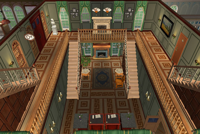 A tall stair hall shows multiple staircases, wood railings, patterned walls, framed art, and a view down into the hotel’s central hall.