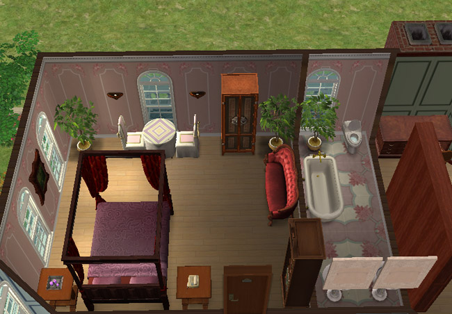 A hotel suite has a burgundy bed, matching sofa, bathroom area, arched windows, side tables, and warm wood flooring.