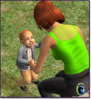 Two red-headed sims, a female adult with a lime green shirt and black pants, and a male toddler in yellow pants an a subtle blue jacket. The woman is crouch down holding the toddlers hands to teach him to walk.