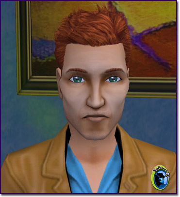 A red-haired male adult wearing glasses and a tan jacket over an bright teal shirt..