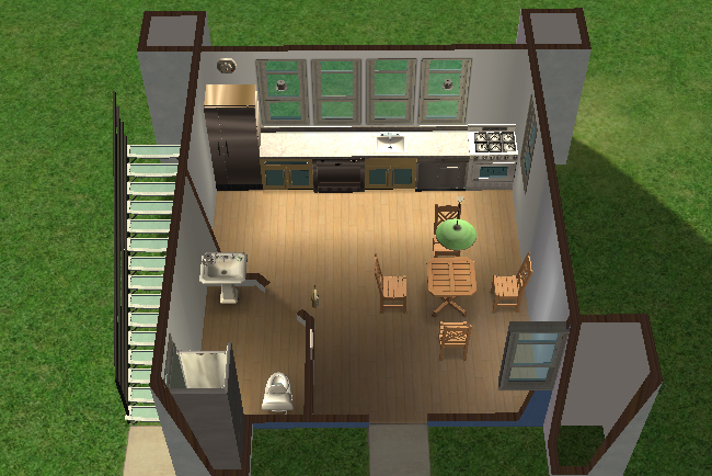 First-floor cutaway view of Pigeon’s Perch featuring a compact kitchen and dining area with open floor space, simple furnishings, and exterior staircase access.