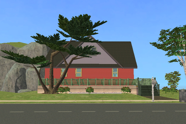 A small red Sims 2 ranch house with a long front porch, green railing, dark roof, trees, shrubs, and a simple front yard.