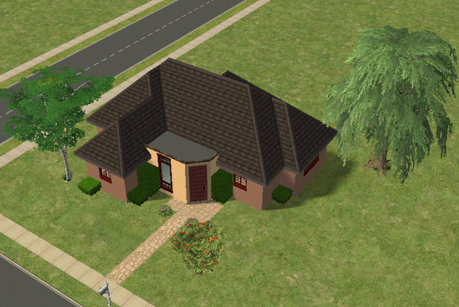 An angled exterior view shows the compact roofline, covered front door, landscaped front path, and open lawn around the house.