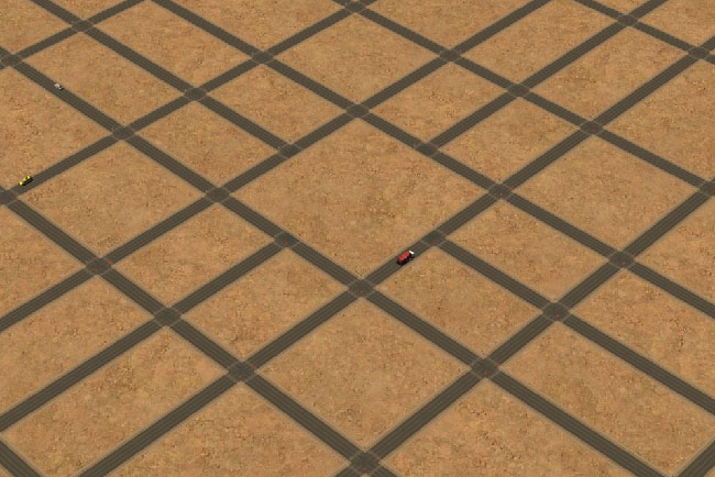 Desert terrain with a varying size of grid lines made of roads.