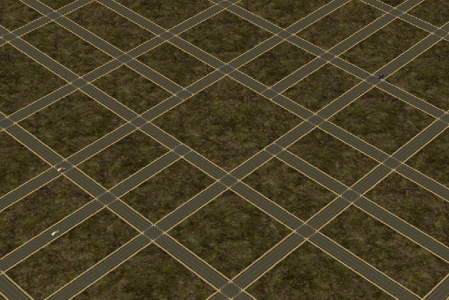 Dirt terrain with a varying size of grid lines made of roads.