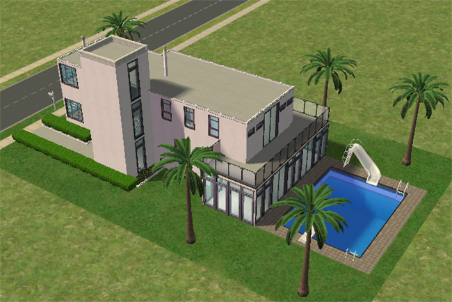 Rear exterior view showing the Art Deco home’s pool area, glass-walled sunroom, upper balcony railing, palm trees, flat rooflines, and backyard swimming pool with slide.