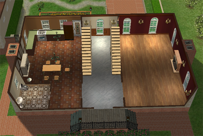 The first floor of a Sims 2 chateau with a formal entry hall, double staircase, kitchen, dining area, bathroom, fireplace, and large living room.