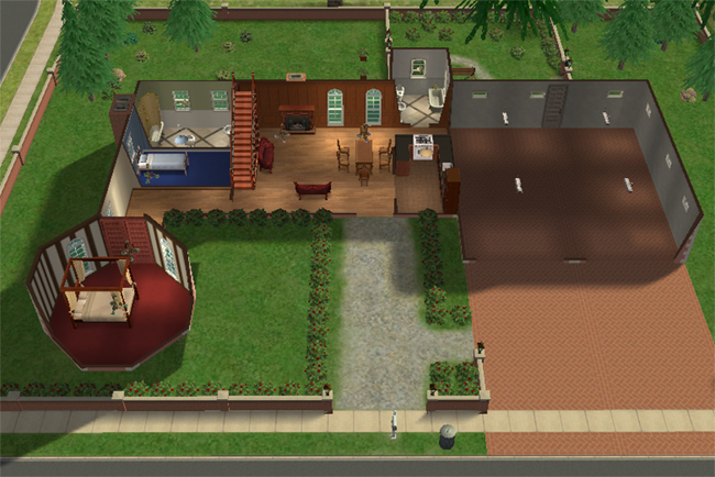 The first floor of a Sims 2 chateau with a detached garage, courtyard-style front garden, kitchen, bathroom, bedroom, stairs, and open living space.