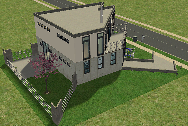 Rear angled exterior view of the modern diagonal house showing flat rooflines, fenced yard space, upper balcony access, and tall contemporary windows.