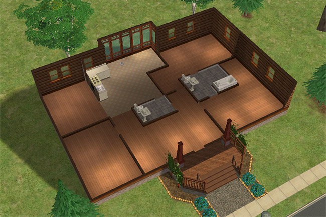 An overhead floor plan of a log home with three bedrooms, two bathrooms, kitchen and bath basics, open living space, and a covered front porch.