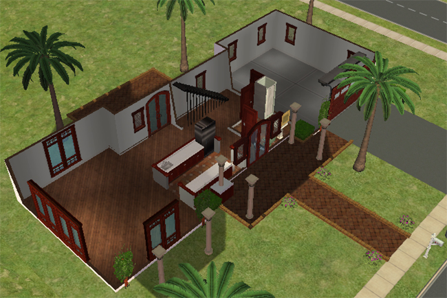 Cutaway first floor view showing an open main level with kitchen space, bathroom area, front entry, covered porch columns, garage access, and large unfurnished living areas.