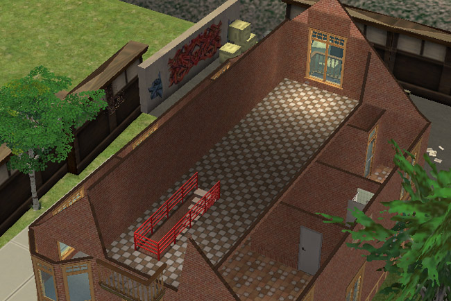 A cutaway view of the third floor shows a long open upper space with brick walls, tiled flooring, windows, and a stair railing near the center.