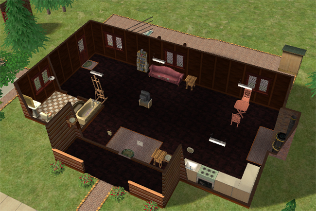 A cutaway view of the first floor shows a large dark-floored interior with a kitchen, bathroom, seating, activity items, and an open central area.