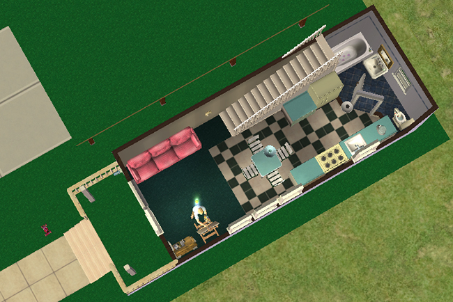 Downstairs floorplan view featuring a combined living room, kitchen, and dining area with black-and-white tile flooring, staircase access to the second floor, and an additional bathroom located just beyond the kitchen.